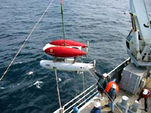 ABE being launched over the side of the ship