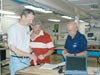 John McDonough, Jeff Ellett, and Will Schroeder discuss the ROV dive schedule 