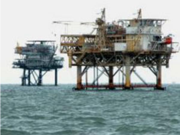 Two conventional oil platforms located near the mouth of the Mississippi River in the Gulf of Mexico.