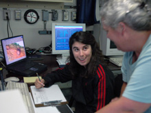 Undergraduate student Sarah White helps collect data during a CTD cast. 