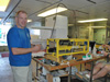 Chemical Oceanographer, Joe Resing, prepares a hydrothermal plume sensor for deployment.