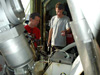 Chief Scientist Chuck Fisher and Guy Telesnicki discuss the placement of gear on the science basket.