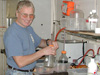 Explorer Vladimir Samarkin prepares to extract methane from a water column sample.