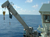 Bosun Wayne Bailey directs deployment of the beam trawl.