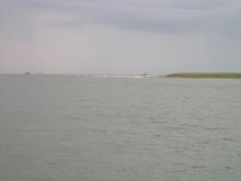 Before Hurricane Katrina a mile long beach existed at the mouth of South Pass.  Today the beach is gone.