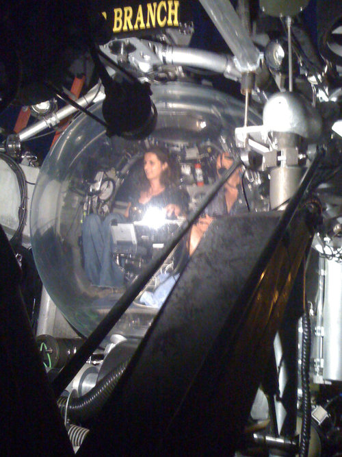 Members of the news media aboard research vessel (R/V) Seward Johnson check out the ship’s submarine. The media was invited to help explain to the public some of the science behind NOAA’s Deepwater Horizon response efforts.