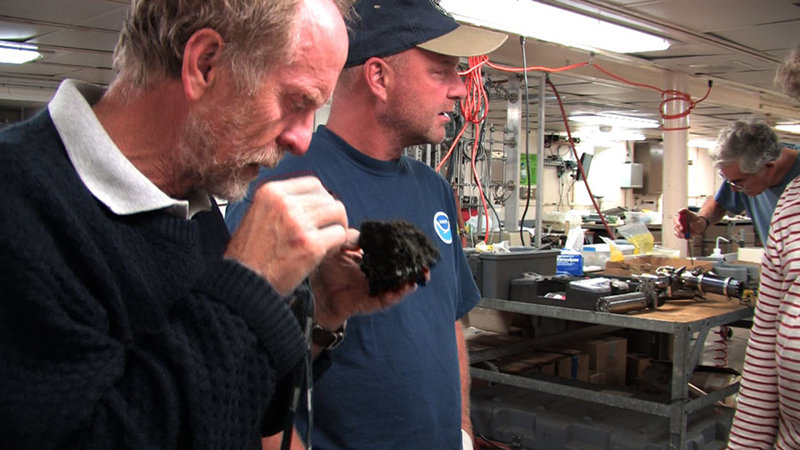 Drs. Richard Arculus (Australian National University) and Tim Shank (Woods Hole Oceanographic Institution) observe samples collected at Mata Ua.