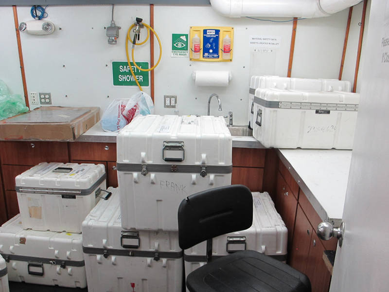 Fig. 1 - A view of the wetlab aboard the <em>R/V Pelican</em> before equipment setup.