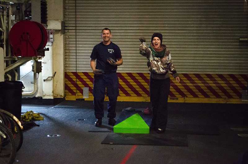 SK1 Francis Purcell and Expedition Coordinator Kate Segarra take a well-deserved break with a round of cornhole.