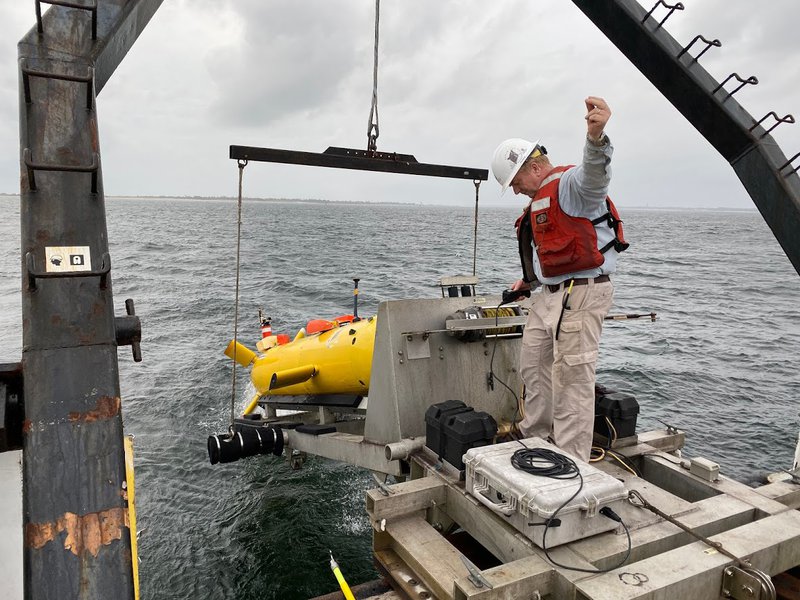 A test launch of the vehicle in the brackish waters of Pensacola Bay with Arne Diercks in the photo.