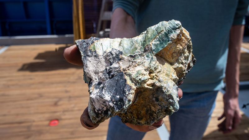 A large rock with serpentine mineralization collected during the In Search of Lost Hydrothermal Cities expedition.