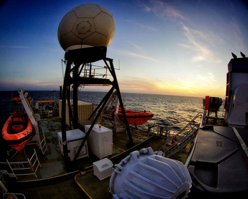 Early morning view from the ship. The VSAT and rescue boats are visible.