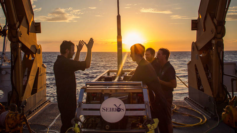 The ROV team spends some time on the back deck planning for the next day’s dive.