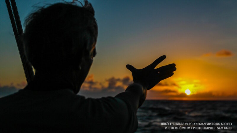 Nainoa Thompson using traditional navigation techniques aboard Hōkūleʻa. Photo: Polynesian Voyaging Society