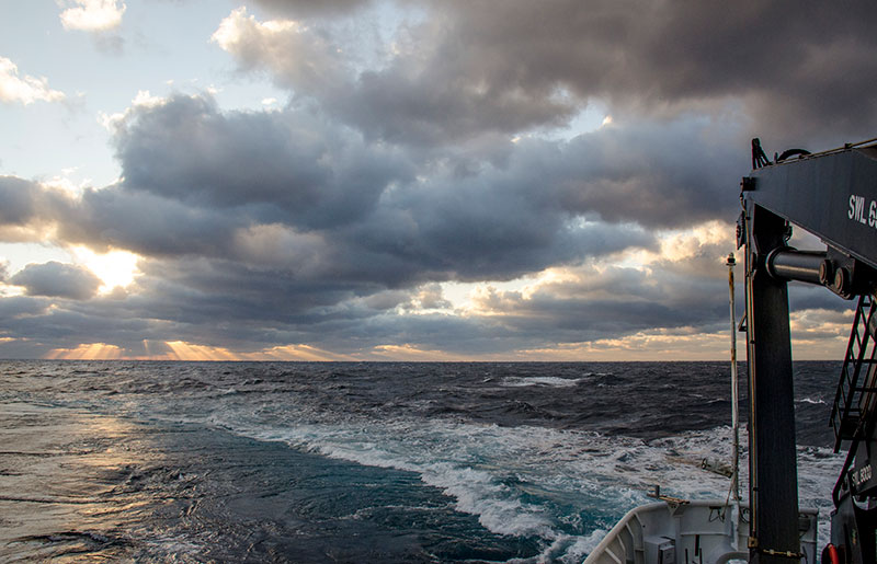 Sunrise over the back of NOAA Ship Okeanos Explorer.